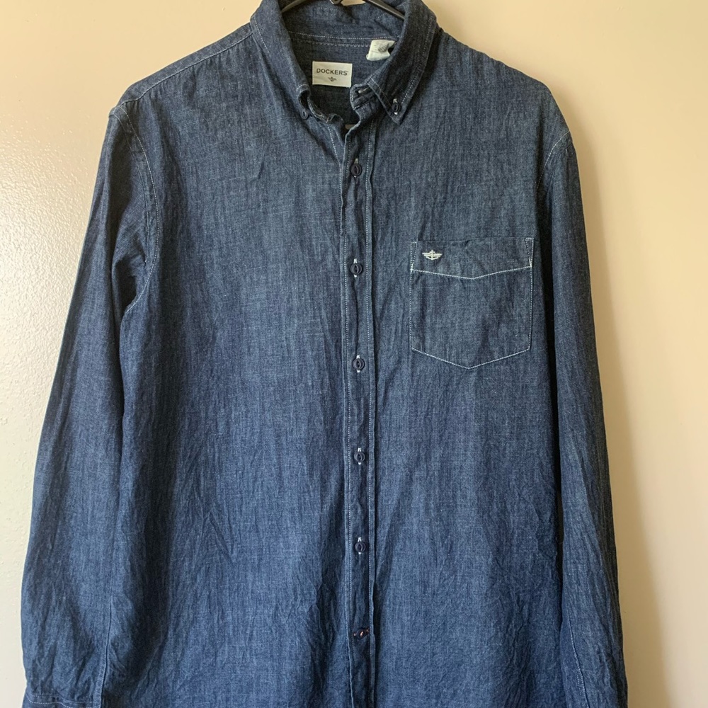 Long sleeved men’s button down denim shirt.